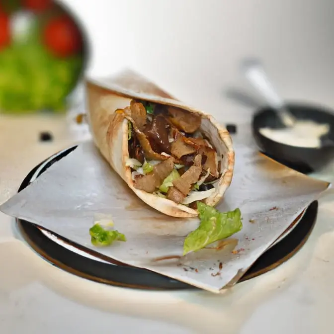 Beef donair wrapped in warm pita bread at Donair and Poutine House in Edmonton, AB