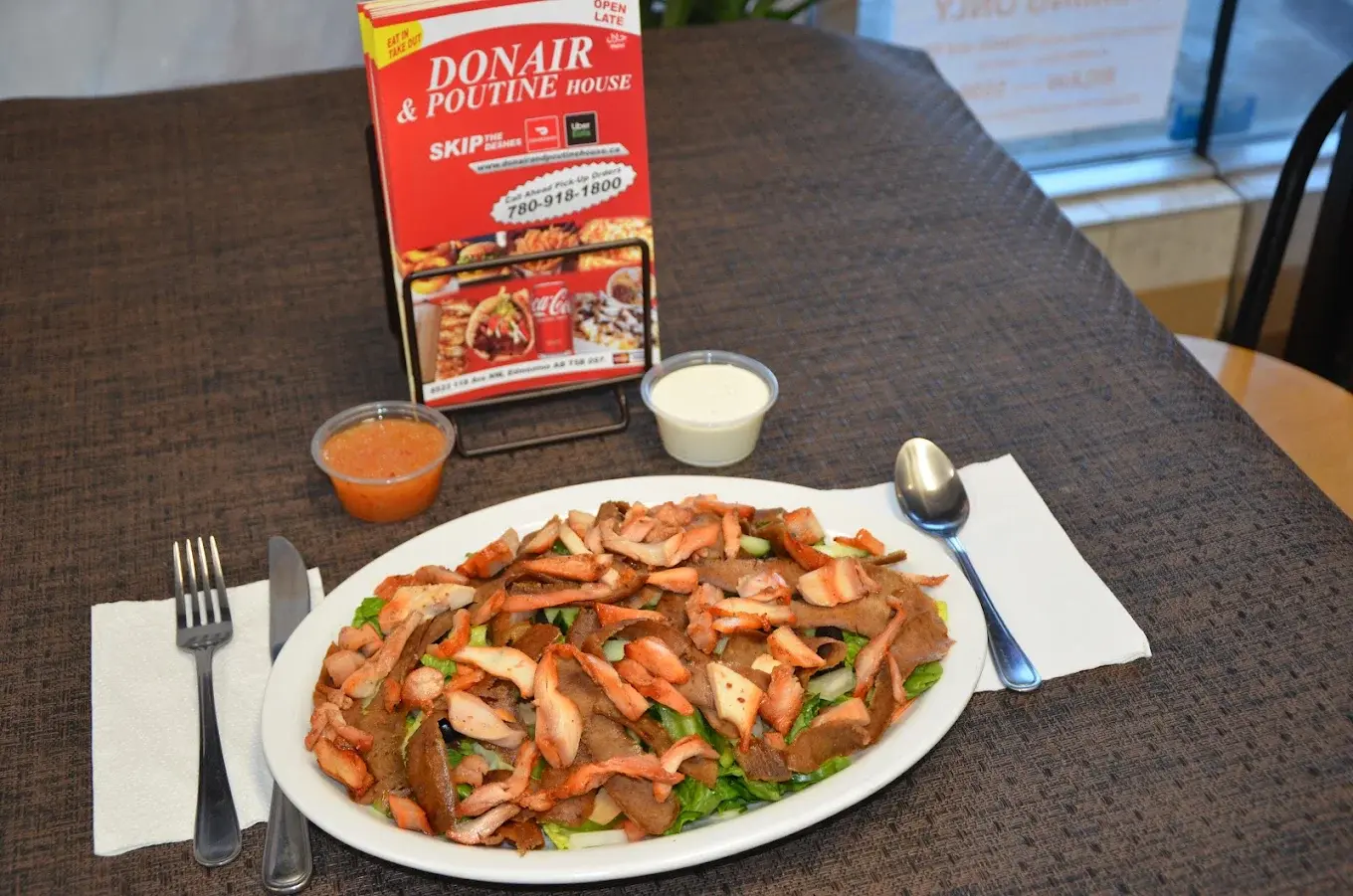 Experience authentic halal Mediterranean cuisine at Donair and Poutine House in Edmonton